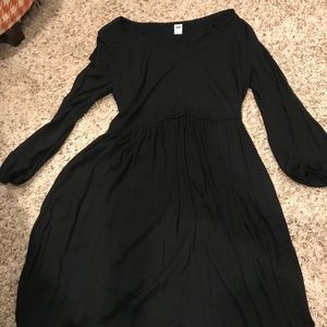 Black, mid-length dress with mid-length sleeves